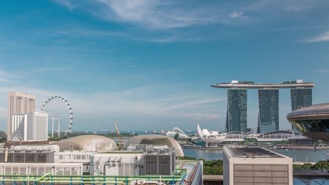 SINGAPORE - CIRCA JAN 2020: Aerial view of Singapore Marina Bay area timelapse with its financial and tourism district, including its latest Marina Bay Sands Integrated Resort in Singapore.