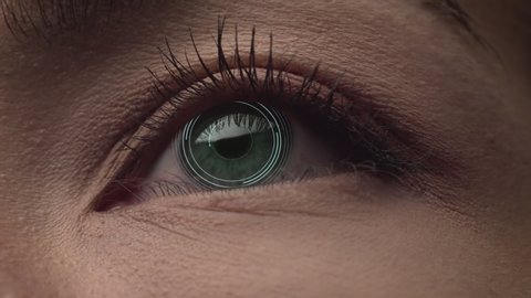 Green female eye with augmented reality virtual inaterface close up shot. Face id.