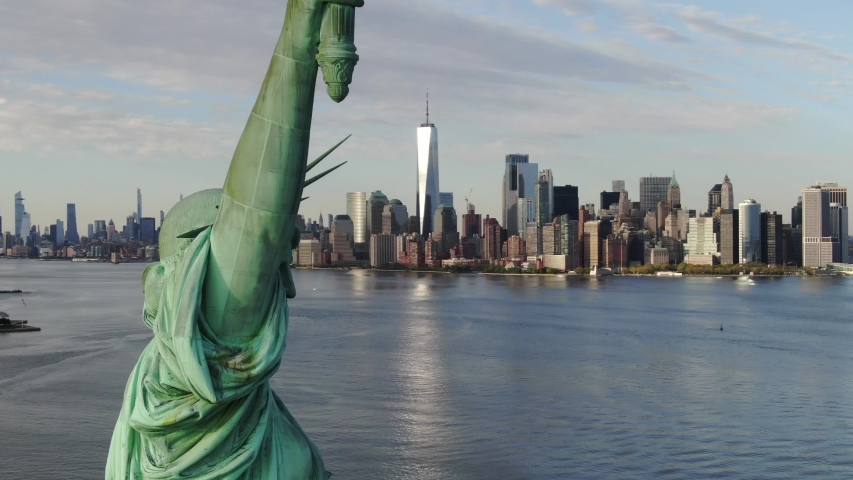 New York, New York USA - May 2020 : Aerial of the Statue Of Liberty near New York City during the COVID-19 Outbreak in May, 2020. Shot is a close up with the New York City Skyline