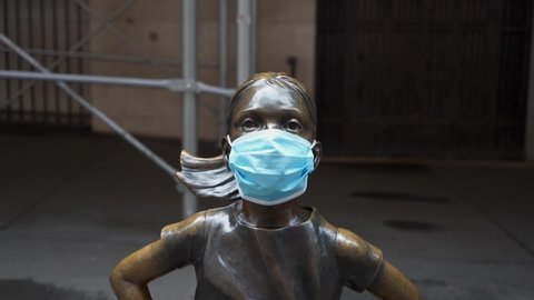 Statue in mask in NY during Pandemic COVID19 (Corona Virus Deases 2019), quarantine, Self isolation and social distancing. Empty town, Manhattan, New York, US 04.25.2019