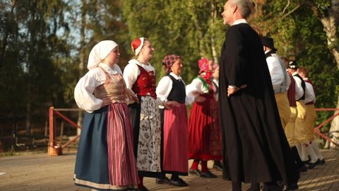 Stockholm, Sweden - July 17, 2018: Swedish folk dancing takes place in Skansen during midsummer.  These types of Scandinavian folk dances are generally done in couples.