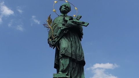Ancient statue on Charles bridge in Prague.