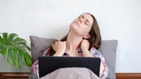 Upset woman in pain touching stiff neck suffering from fibromyalgia massaging tensed muscles to relieve back joint shoulder ache tired after long sedentary computer work in incorrect posture concept