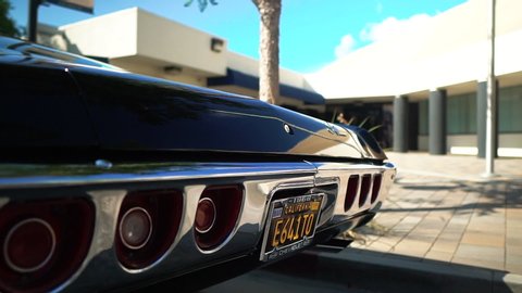 Lancaster , California / United States - 09 28 2019: Beautiful 1960s Impala parked along curb at car show