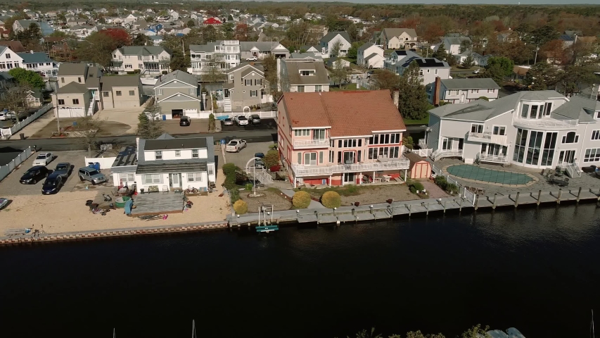 Aerial shot of neighborhood, suburb. Real estate,, along the Connecticut River. USA