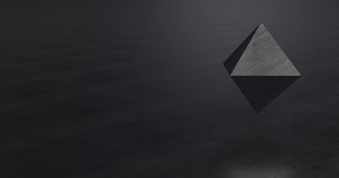 4k video animation of rotating octahedron on reflecting floor. Minimal black. Rendering loopable elements.
