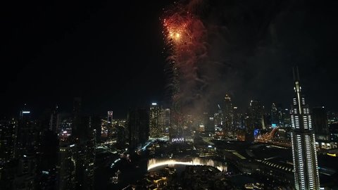 Dubai, United Arab Emirates - 12/31/2019 : Variations in fireworks with beautiful colors displayed on New Year's night, drone shot.