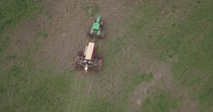 Aerial view of tractor in agricultural field, Russia