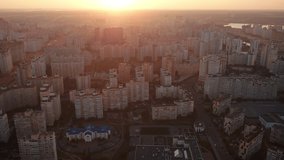 Aerial view of a city at sunset. High quality footage