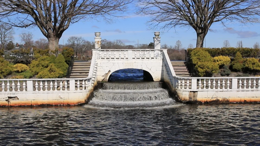 Argyle parks water fall in Babylon Village with heavy stream of water falling