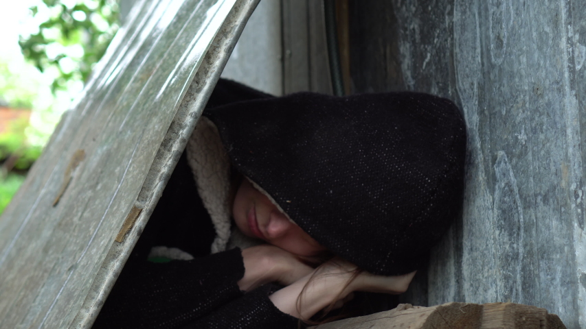 Homeless woman portrait.  Female homeless on the street.