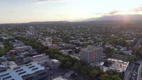 Mendoza, Argentina - February 6, 2020: Aerial view of long tree-lined streets and residential buildings in downtown Mendoza, Argentina.