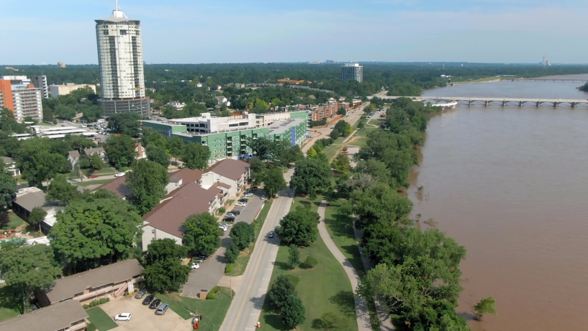 Tulsa, Oklahoma, USA. Aerial city skyline, suburbs & W 23 st bridge over the Arkansas River.