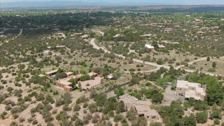Santa Fe, New Mexico, USA. Aerial flying over the houses in the desert city 