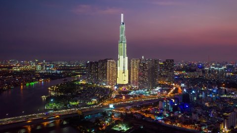 Ho Chi Minh City, Vietnam - February 24, 2020 : Aerial Hyper lapse of Landmark 81 in sunset and moving traffic