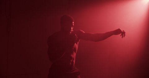 Shadow boxing boxer in red