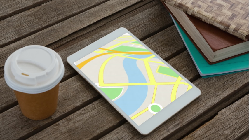 Animation of a digital tablet showing a map with a highlighted spot on the screen. Coronavirus Covid-19 technology concept digital composition