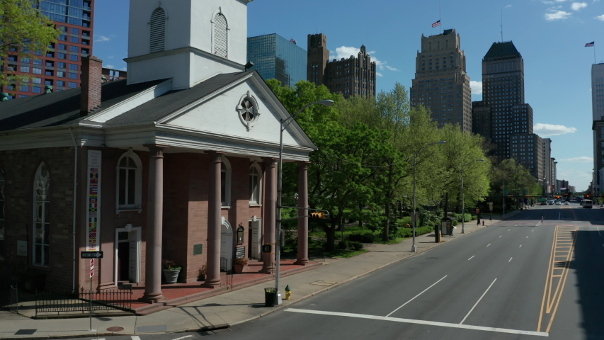 rising shot Trinity Church revealing downtown Newark