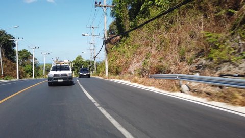 15 MARCH 2020, PHUKET, THAILAND: Phuket roads in Thailand, first-person view of traffic on roads in Phuket