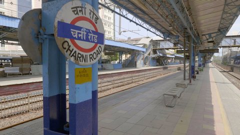 Empty or deserted suburban local train platform during national lockdown amid coronavirus COVID19 Corona epidemic pandemic Charni Road railway station, Mumbai, India (April 2020)