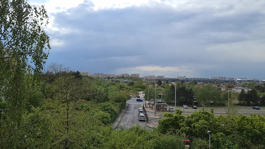 Timelapse of clouds above Prague city. Fast moving clouds above city in summer. Cloudy weather.