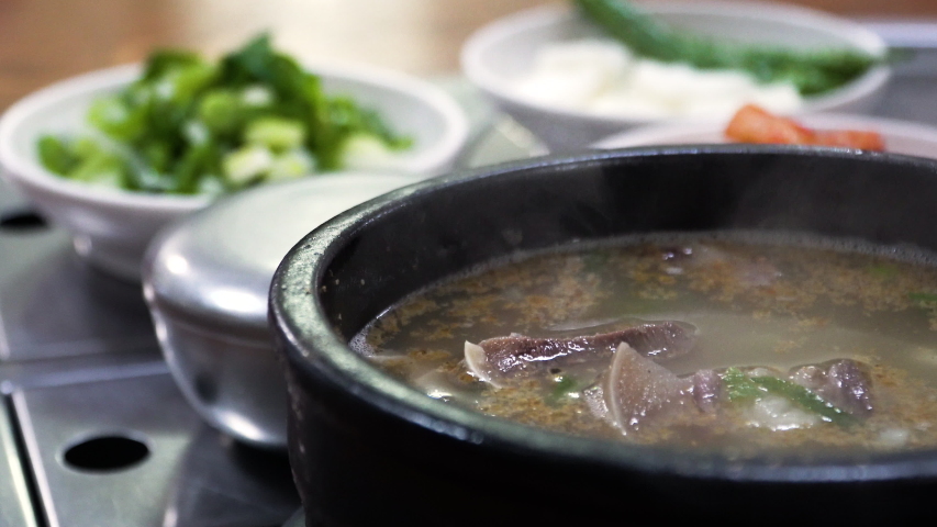 Someori(cow's head) gukbab is korea traditional meal beef soup with steam rice Royalty-Free Stock Footage #1052344033