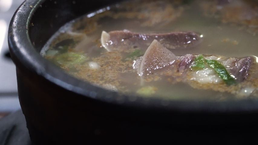 Someori(cow's head) gukbab is korea traditional meal beef soup with steam rice Royalty-Free Stock Footage #1052344036