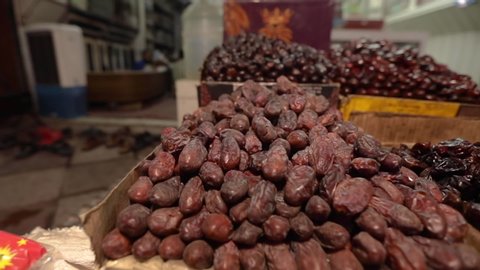Date fruit in market for selling.Dry fruits dates closeup market.