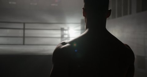 A motivated muay thai sportsman walking towards sparring ring, ready for a fight - martial arts, way to success concept 4k footage