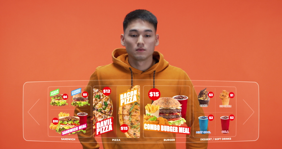 Medium shot of teenager using virtual icons to order fast food online