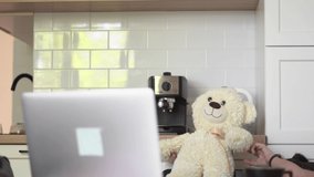 Online storytelling for kids with toys. Teddy bear video call. Covid-19 quarantine