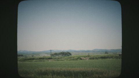 Driving through the countryside of UTAH, USA. View from a car's window. VINTAGE FILM.