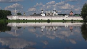 View of the Tikhvin assumption monastery from lake Tabora on a July day. Leningrad region, Russia 
