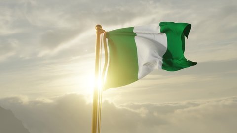 Flag of Nigeria Waving in the wind, Sky and Sun Background, Slow Motion, Realistic Animation, 4K UHD 60 FPS Slow-Motion