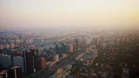 BEIJING, CHINA - JUNE 16, 2017: The view from the window of a skyscraper on a foggy summer evening in Beijing.