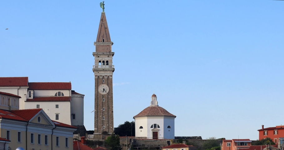View on Tartini main square, ancient buildings with flag, St. George