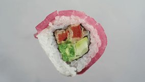 Sushi roll set on a white background. Various Sushi japanese food in restaurant.