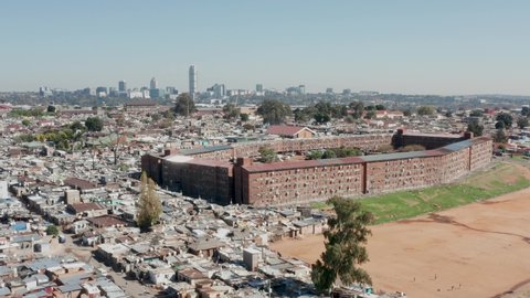 Aerial view of Alexandra Township showing its close proximity to Sandton, Johannesburg. A clear example of inequality and the stark divide of wealth in South Africa. 