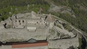Establishing aerial view of the High Castle in Visegrad, Hungary. European landscape 4K d-log raw stock video.