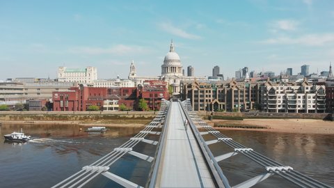Drone shot Millenium bridge and St. Paul's Cathedral, almost nobody - 4K