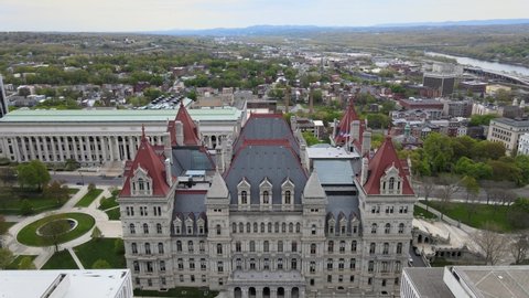 Albany, New York / United States - May 14 2020: Aerial Footage of the empire state plaza revealing the capitol building and Albany skyline. 