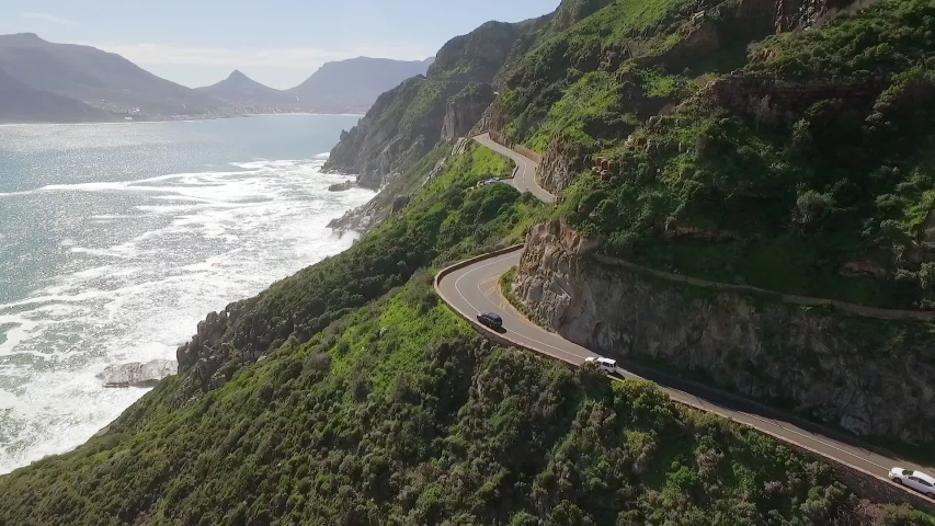 SOUTH AFRICA - CIRCA 2020 - An aerial view shows cars are seen driving by the seaside along Chapman