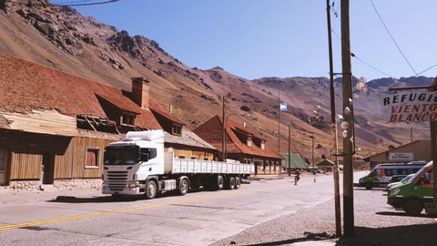 Las Cuevas, Argentina - March 2020: Truck on Road in Las Cuevas, a Small Town in the Andes Mountains, Mendoza province, Argentina. 4K Resolution.