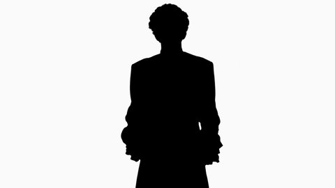 Silhouette Man in 18th century camisole and wig doing welcoming gesture.