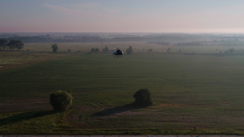 Aerial view of flying helicopter. High quaility footage, Ukraine