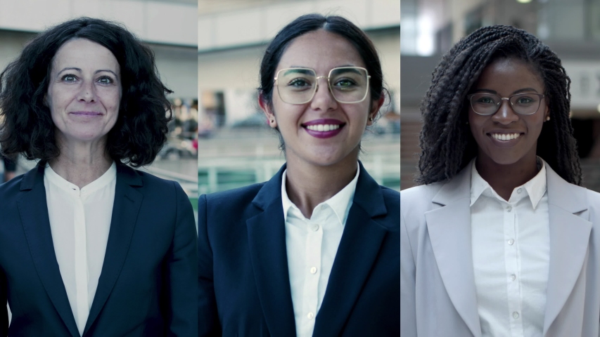 Happy successful businesswomen of different ages and races. Women wearing formal suits, posing and smiling at camera. Multiscreen montage, collage portraits. Business people concept Royalty-Free Stock Footage #1052569694