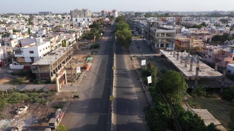Bharuch, Gujarat/India- May 05,2020: Aerial shots during lockdown due to COVID 19 coronavirus pandemic in India. Empty roads. Railway station. Shops closed in city life for prevention.