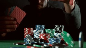 Super slow motion of poker player throwing chips towards camera. Filmed on high speed cinema camera, 1000fps. - Powered by Shutterstock - Get 15% off with code: PIKWIZARD15