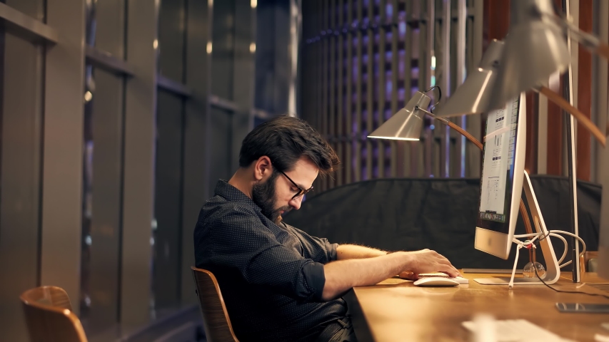 Tired Businessman Sleeping On Workplace.Frustrated Businessman Working Alone. Workaholic Work In Internet Deadline.Office Work Overtime.Tired Overwhelmed Exhausted Stressed Businessman In Night Office | Shutterstock HD Video #1052597510