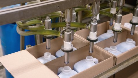 High Tech Manufacturing Facility Fills numerous plastic bottles with sanitizer, antibacterial soap, and detergent. 